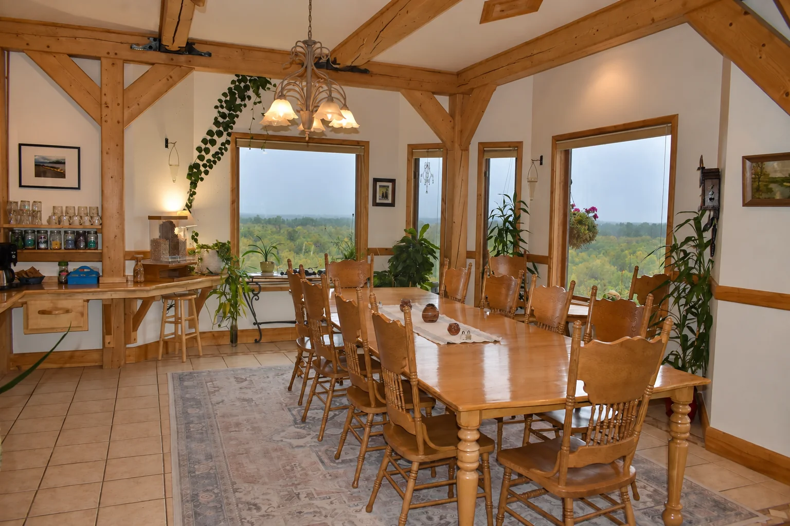 Dining room and surrounding Alaska views at Denali Overlook Inn